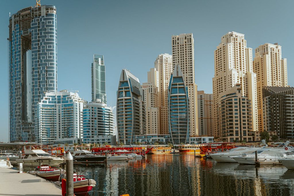 Panoramic view of Dubai Marina showing iconic skyscrapers and yachts